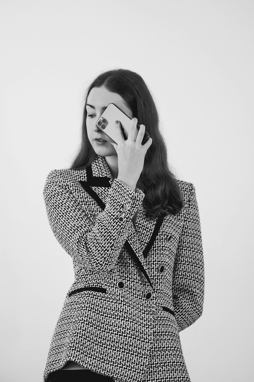 Studio portrait of a German woman sociology researcher in a blazer