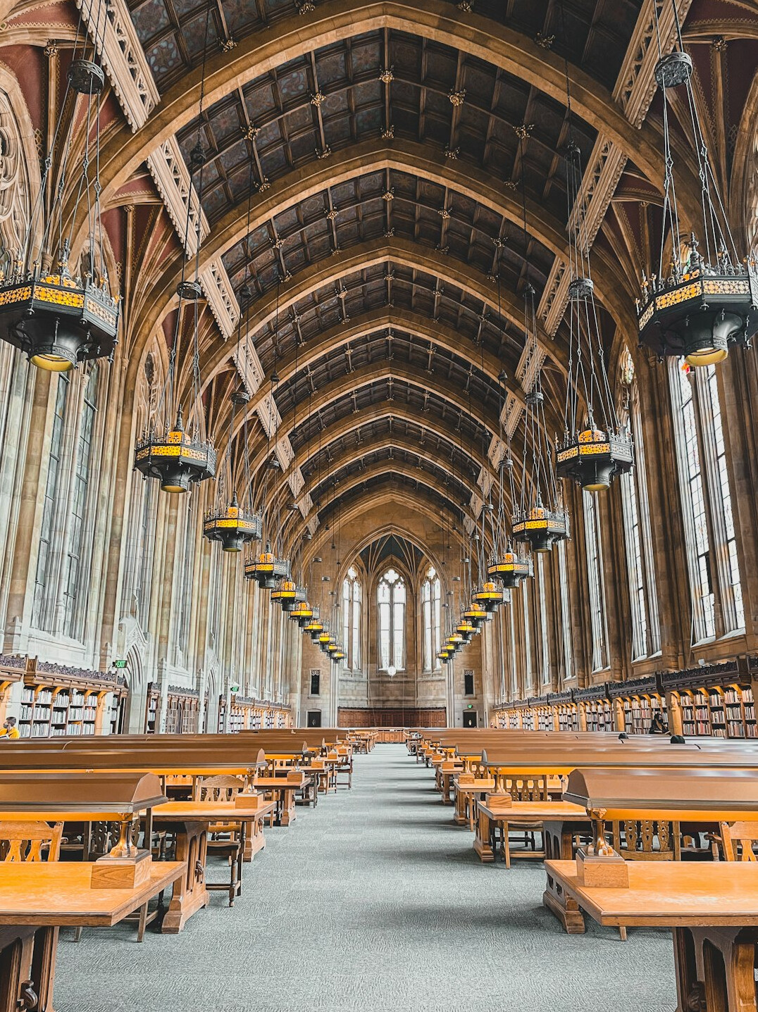 Empty reading room of a European academic institute with wooden tables
