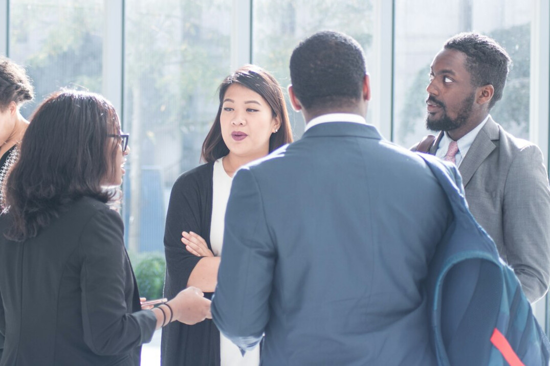 diverse group discussing opinions