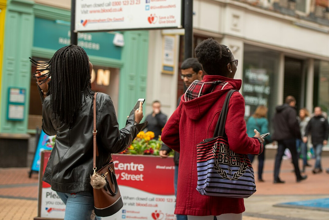 people interacting in public space