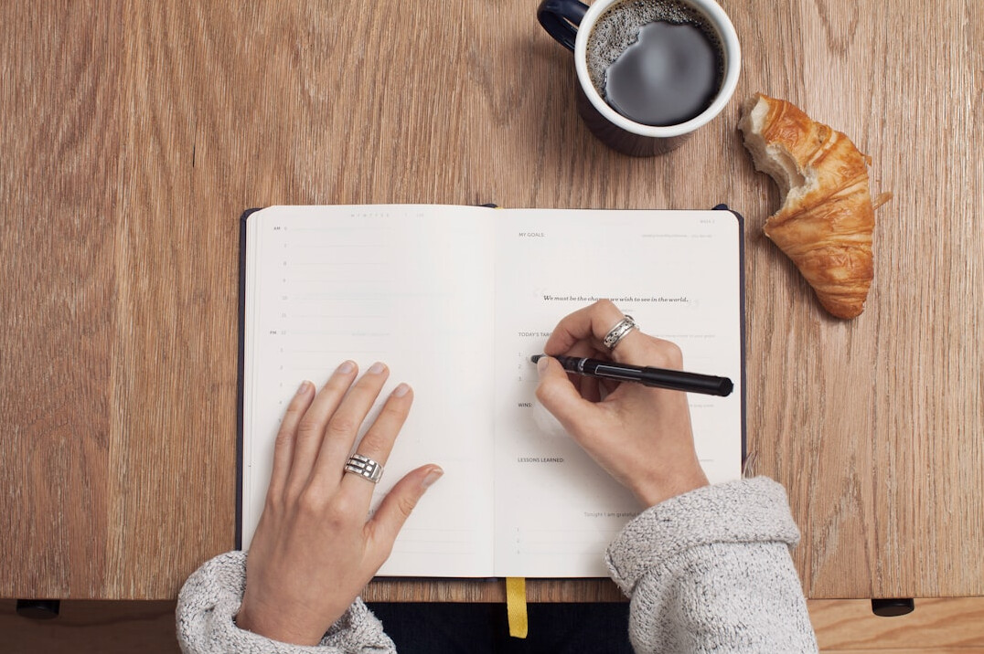 person journaling thoughts